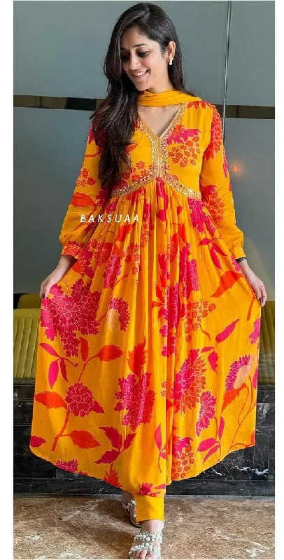 Launching Yellow With Red Flourish Pattern Aliya Cut Gown Adorne With Intricate Dori Work, Moti Work (Pearl) and Daliya Work which enhances the Neckline Luxurious Look and Feel.?????????